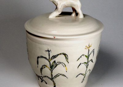Bobcat in the Corn Jar.  8H x 6 Dia. Porcelain. Cone 10 2021
